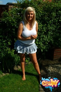 Hot and sexy Ellie Jay plays with her huge Breasts